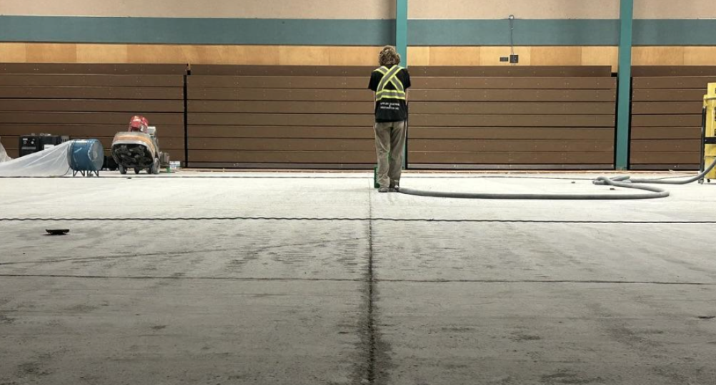During construction supply and install new hardwood gym floor at thomas haney secondary maple ridge bc 1