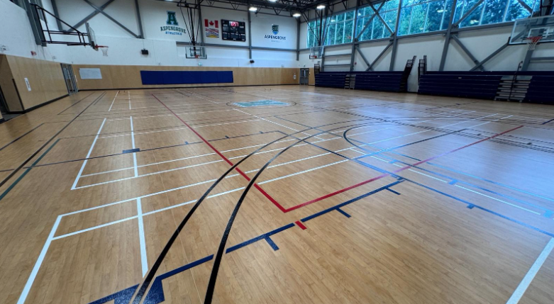 Supply and install tarkett lumaflex gym floor system at aspengrove school lantzville bc