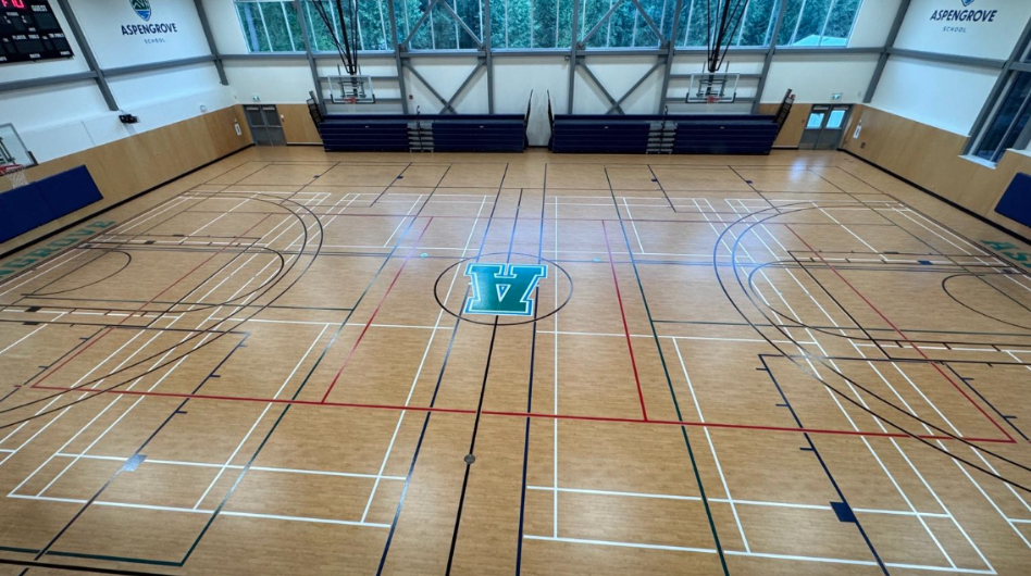 Tarkett lumaflex gym floor system at aspengrove school lantzville bc by titan sport systems
